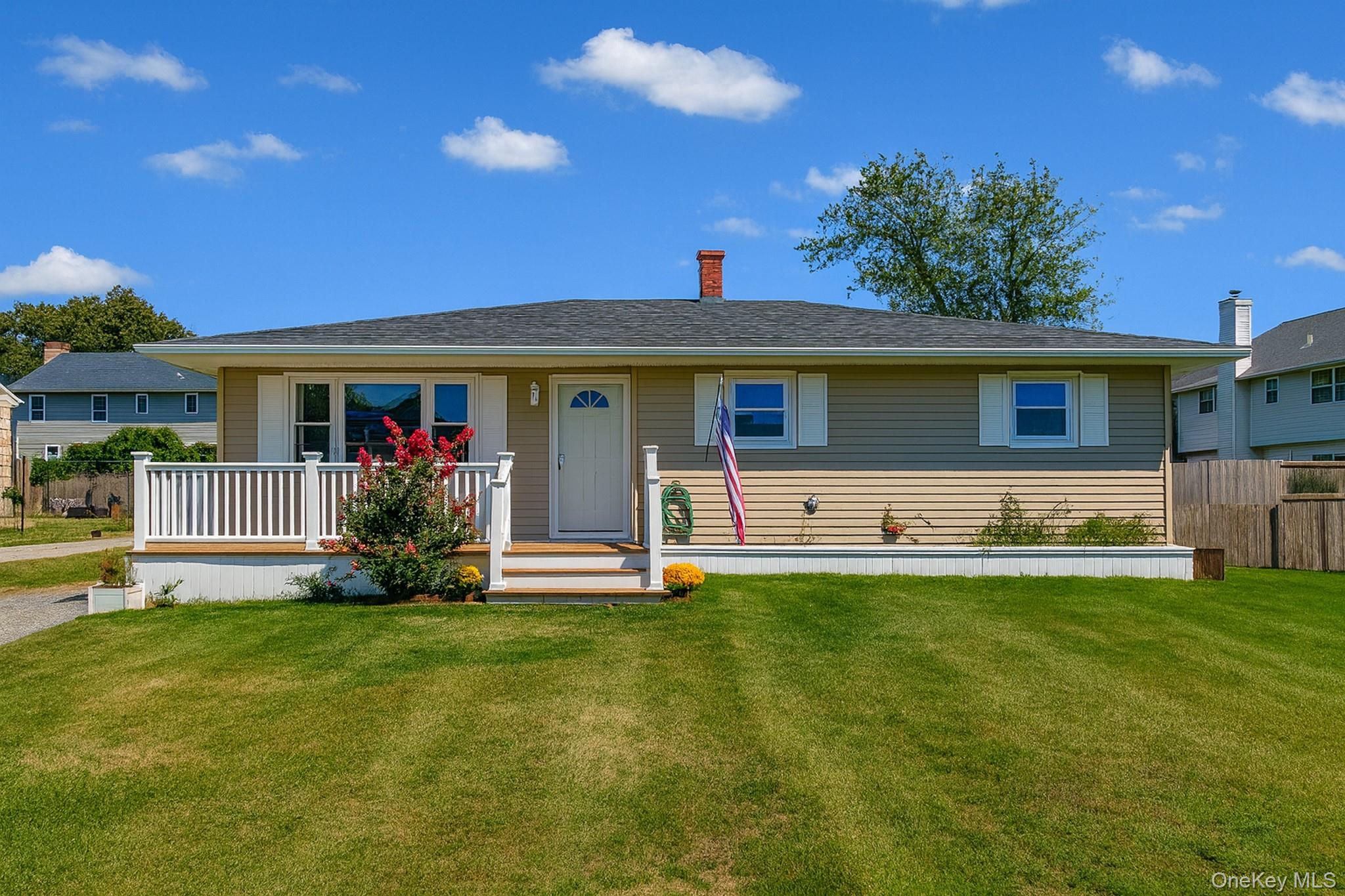 a front view of house with yard