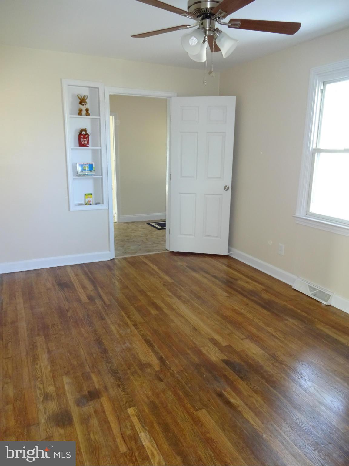 958 Martin Road Baltimore, MD 21221 - Photo 16 of 19 2nd Bedroom w/ Wood Floors & Ceiling Fan