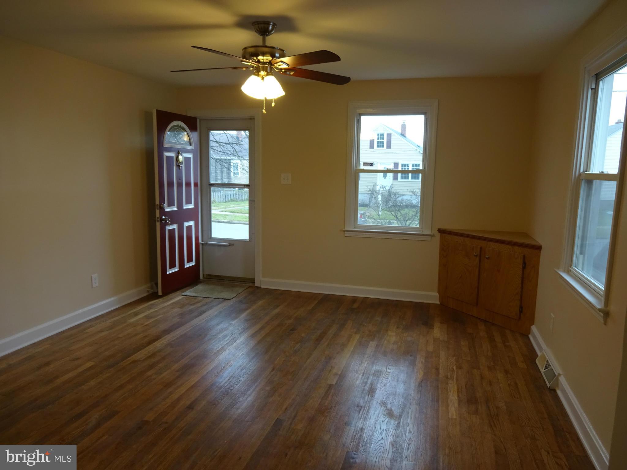 958 Martin Road Baltimore, MD 21221 - Photo 8 of 19 Dining Room offering Wood Floors & Ceiling Fan