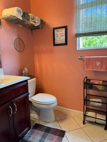 35875 Donny Circle Palm Desert, CA 92211 - Photo 25 of 50 a bathroom with a toilet a sink and a window