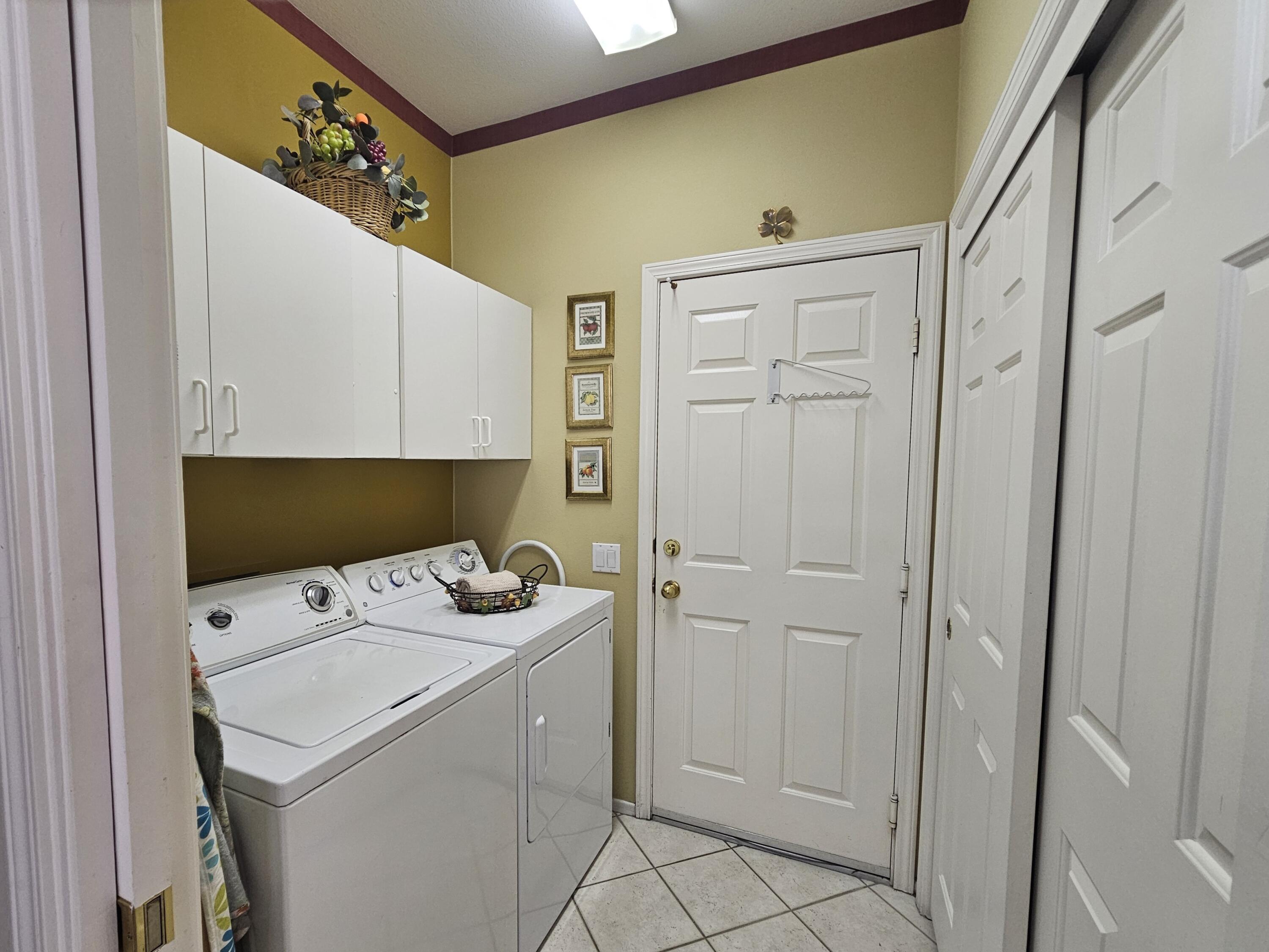 35875 Donny Circle Palm Desert, CA 92211 - Photo 30 of 50 a utility room with dryer and washer