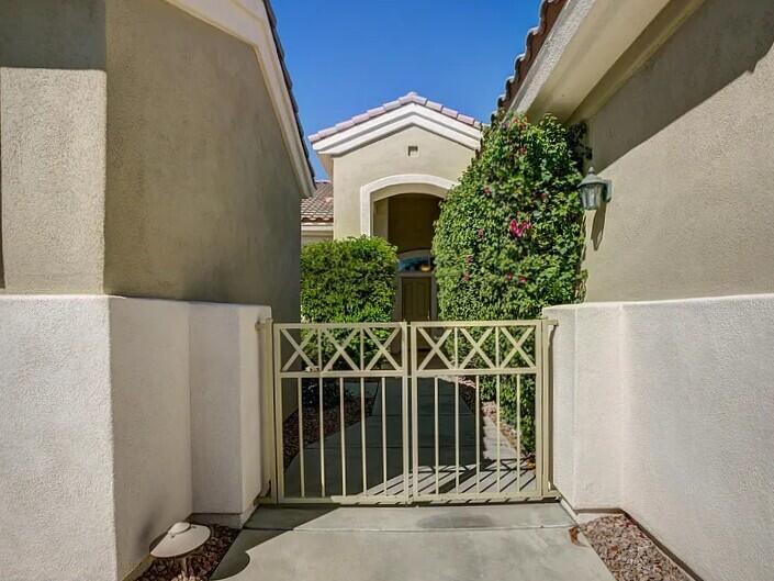 35875 Donny Circle Palm Desert, CA 92211 - Photo 3 of 50 a front view of a house with plants