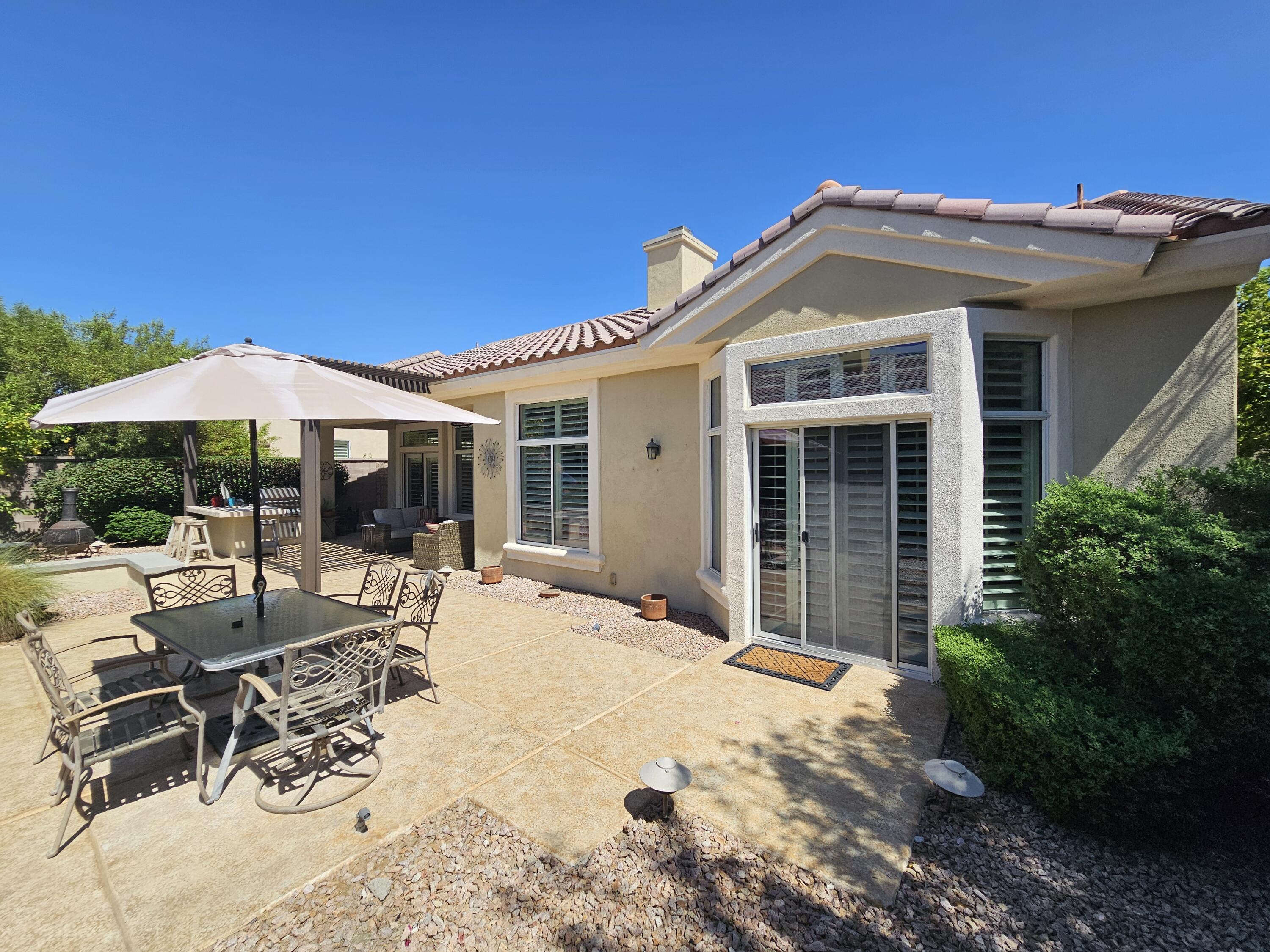 35875 Donny Circle Palm Desert, CA 92211 - Photo 34 of 50 a view of a house with backyard and sitting area