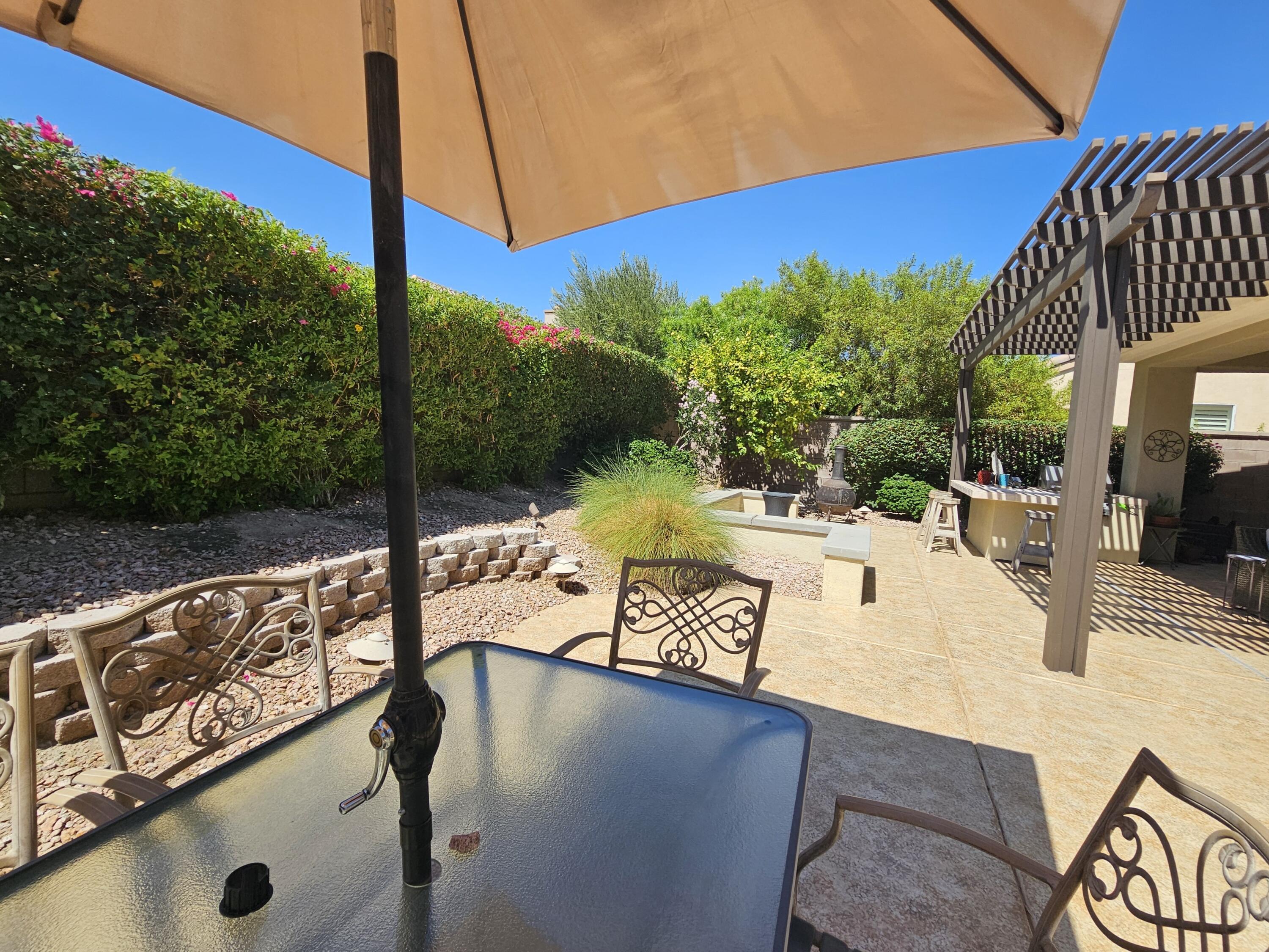 35875 Donny Circle Palm Desert, CA 92211 - Photo 35 of 50 a view of a swimming pool with a patio