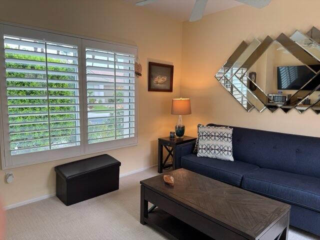 35875 Donny Circle Palm Desert, CA 92211 - Photo 44 of 50 a living room with furniture and a window