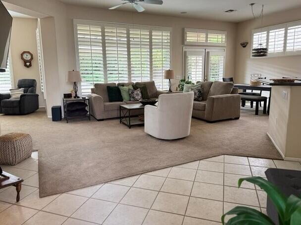 35875 Donny Circle Palm Desert, CA 92211 - Photo 6 of 50 a living room with furniture and a large window