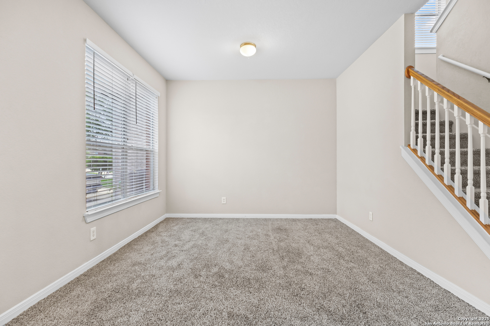 156 Springtree Bluff Cibolo, TX 78108 - Photo 12 of 42 a view of an empty room with a window