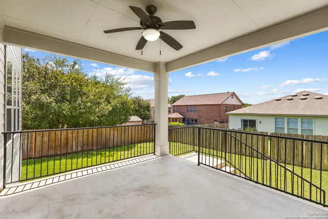 a view of a back yard of the house