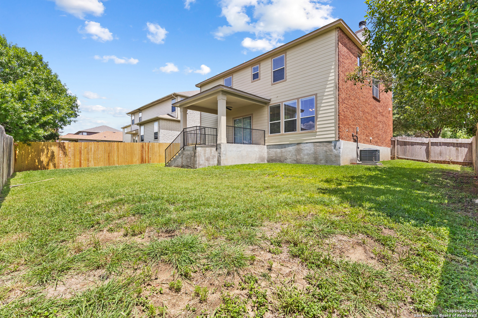 156 Springtree Bluff Cibolo, TX 78108 - Photo 41 of 42 a view of a house with a yard and sitting area
