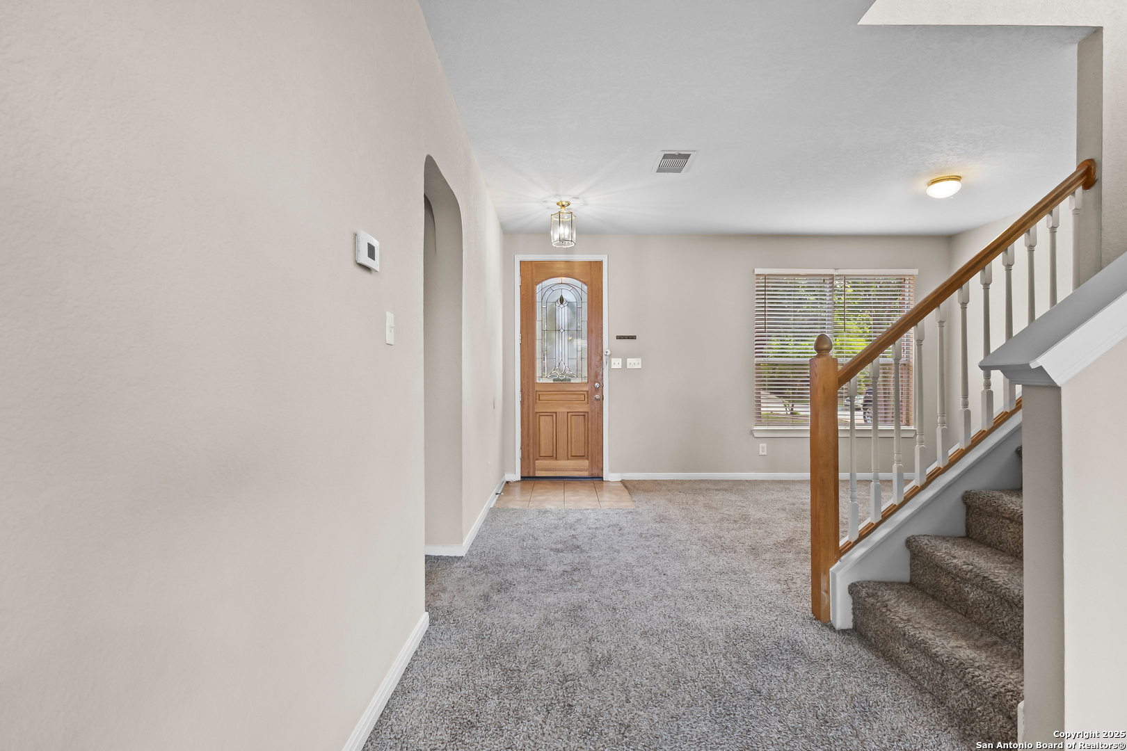 156 Springtree Bluff Cibolo, TX 78108 - Photo 5 of 42 a view of hallway with stairs