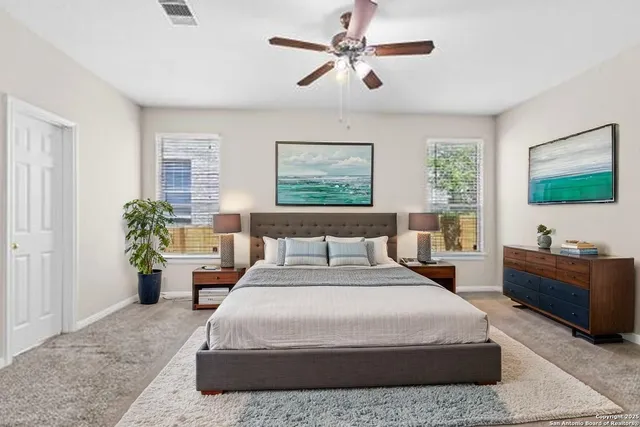 a kitchen with a sink refrigerator and microwave