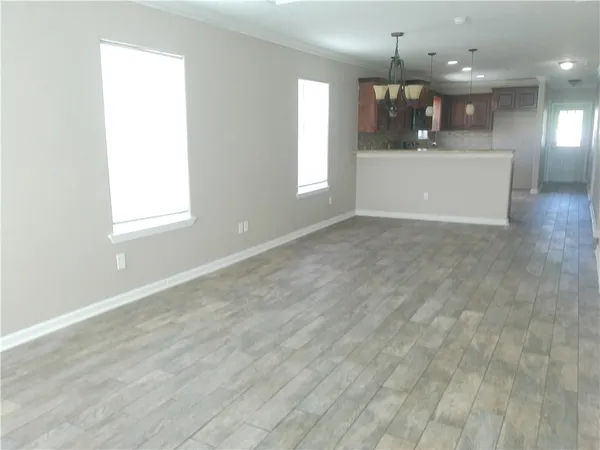 a view of an empty room and window