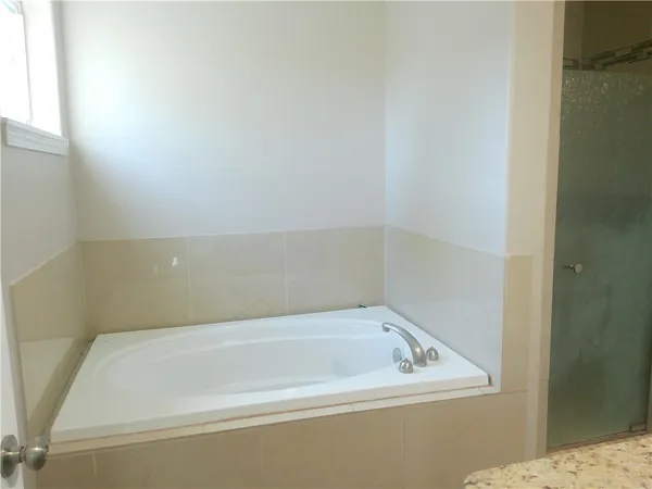 a bathroom with a bathtub