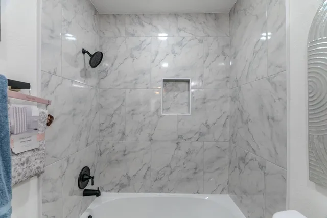 a bathroom with a bathtub