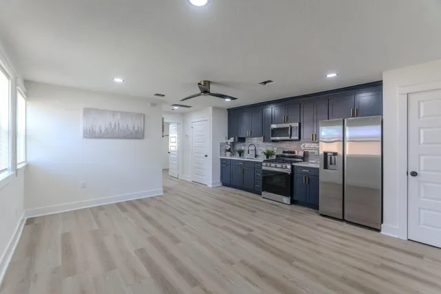 a view of a patio with a backyard