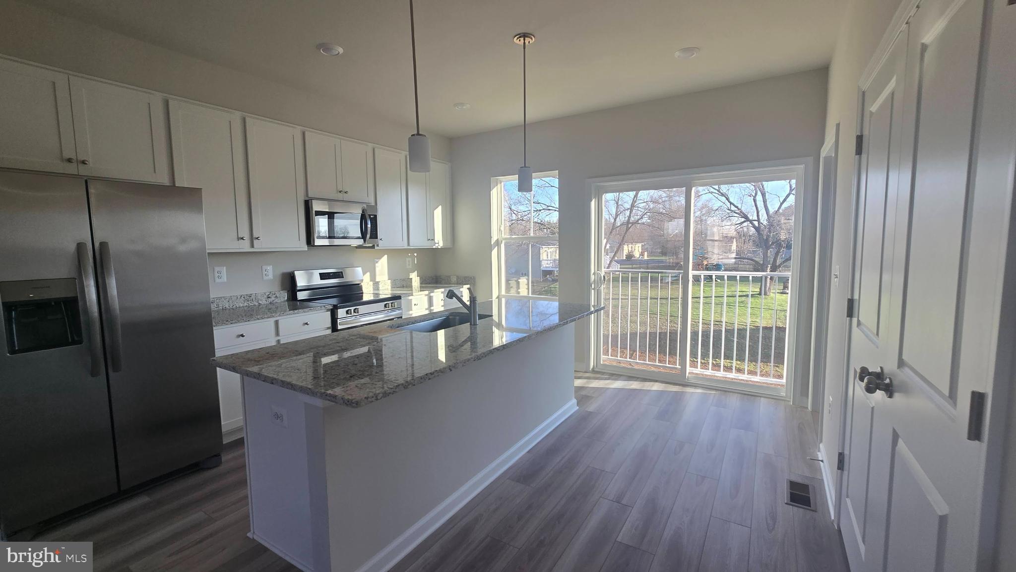36 Canning Road Inwood, WV 25428 - Photo 20 of 29 a kitchen with counter top space and wooden floor