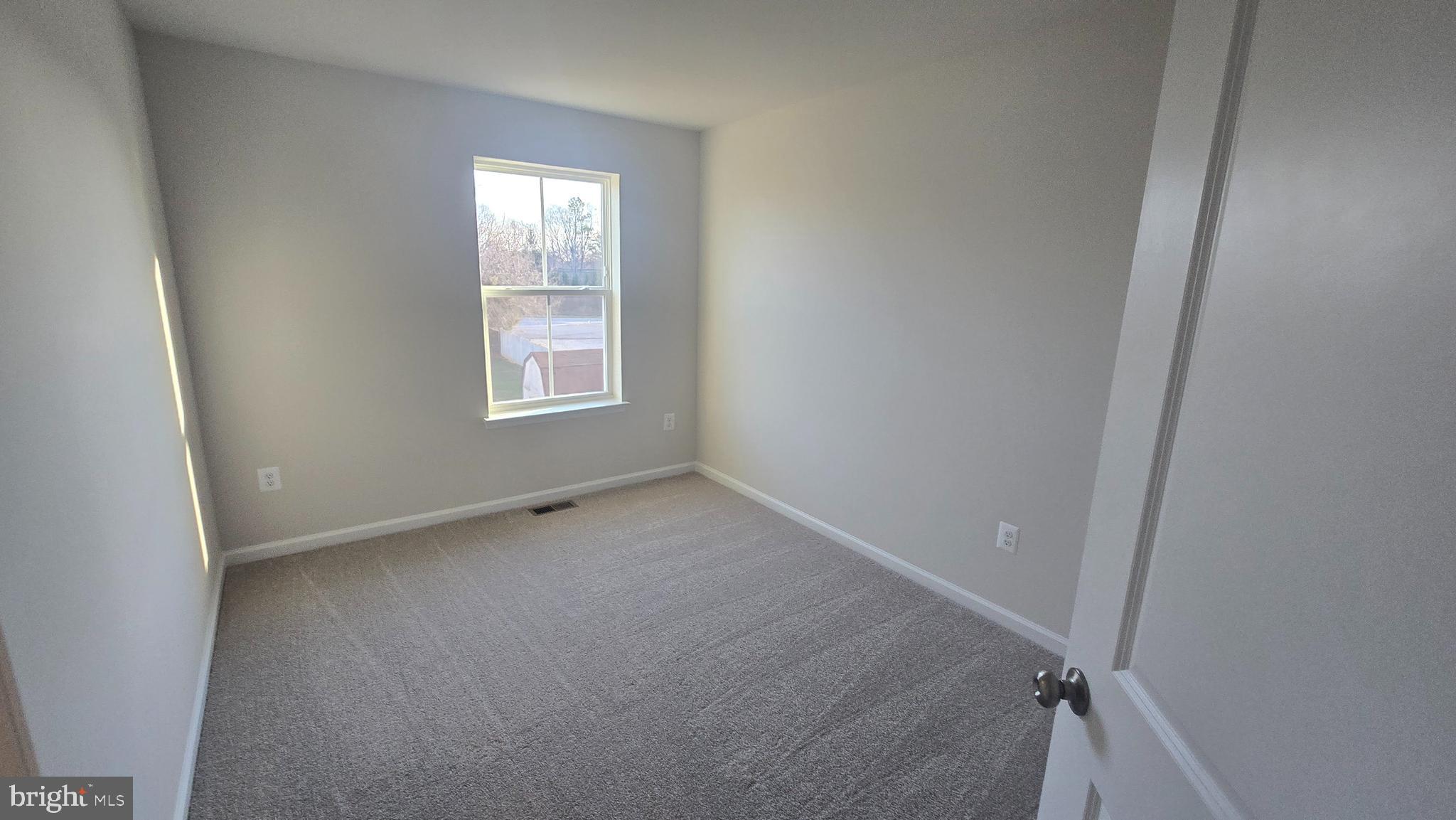 36 Canning Road Inwood, WV 25428 - Photo 25 of 29 an empty room with a window