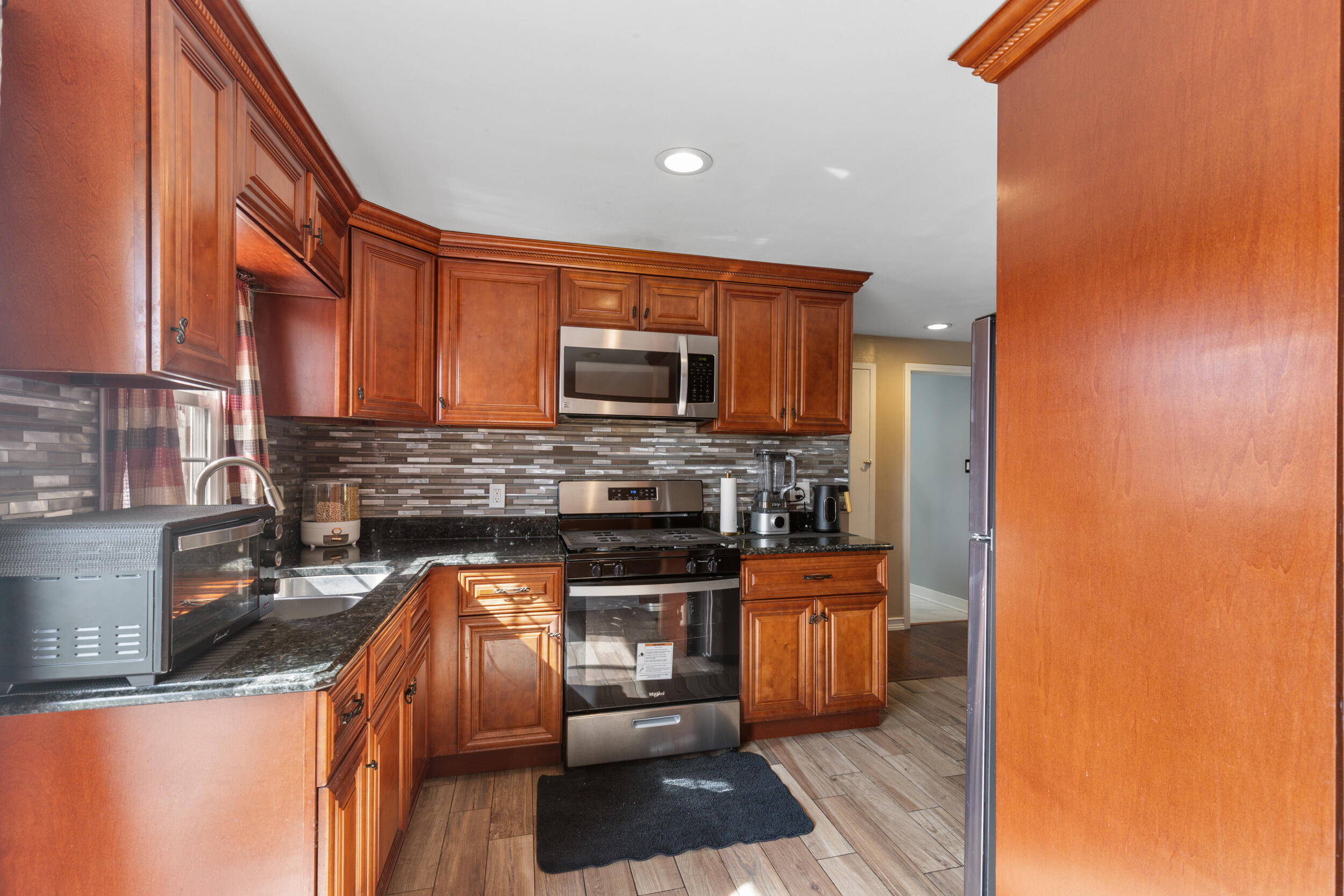 3319 South 25th Street Milwaukee, WI 53215 - Photo 11 of 31 Kitchen looking to hall