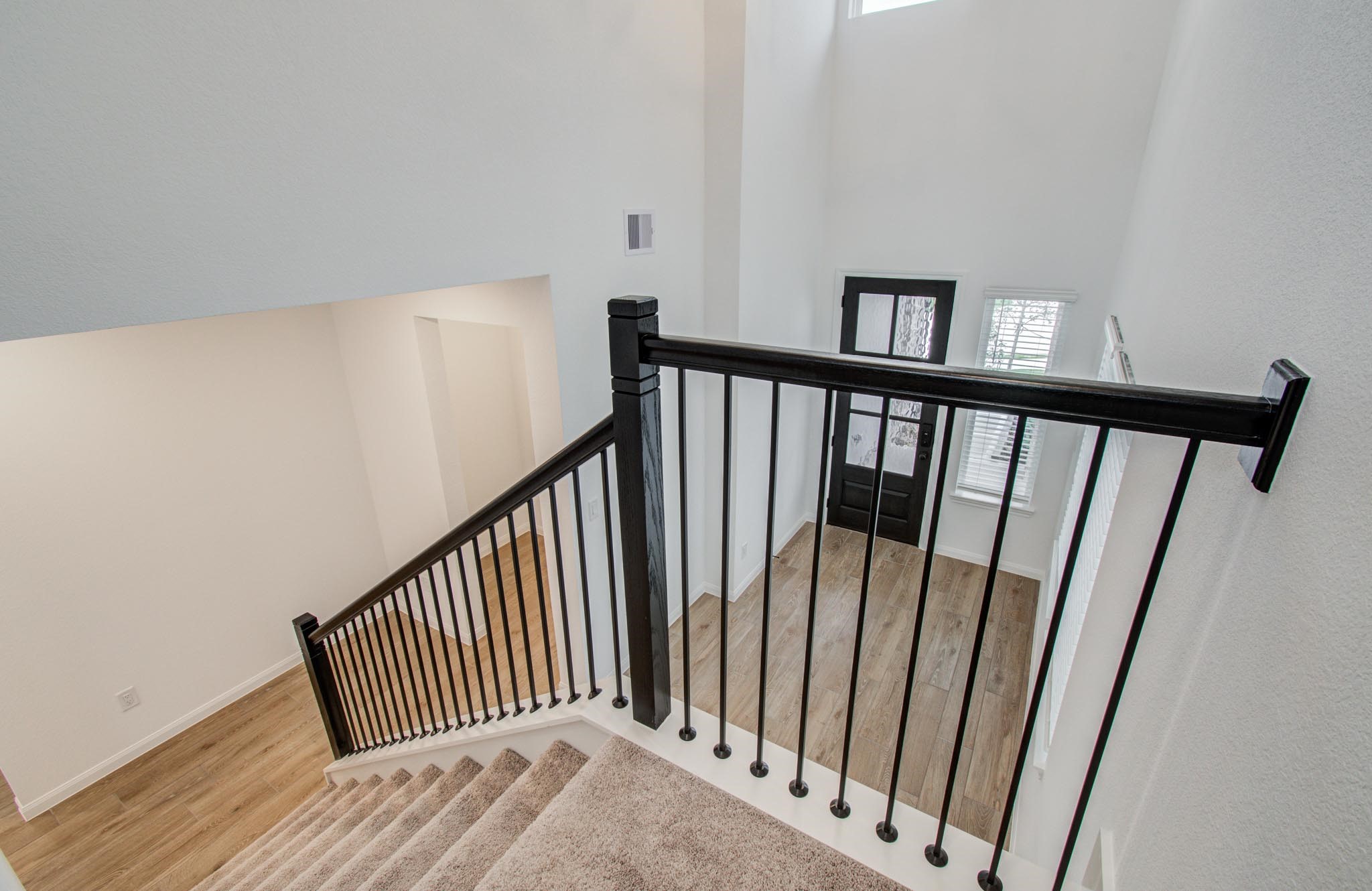 7231 Yarrow Blossom Court Katy, TX 77493 - Photo 35 of 49 a view of a hallway with staircase