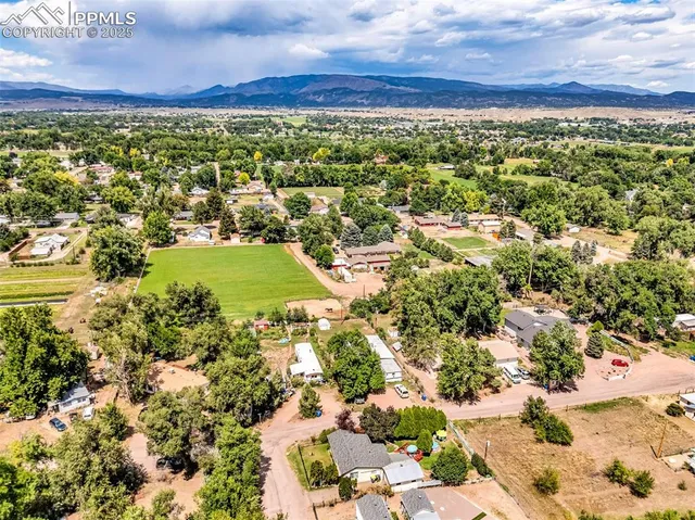 a view of a yard with an umbrella