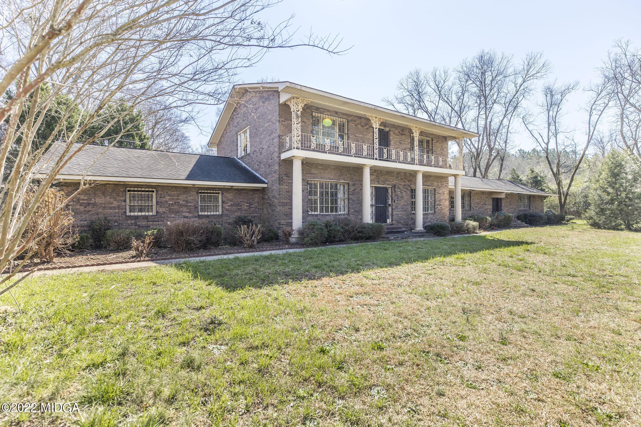10 Mattie Road Fort Valley, GA 31030 - Photo 1 of 48 a front view of house with yard and trees around