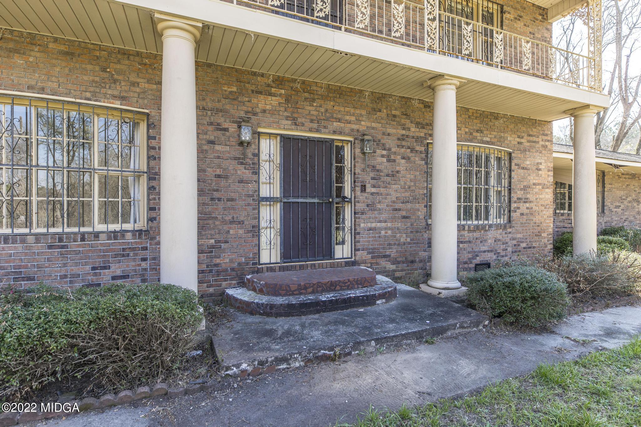 10 Mattie Road Fort Valley, GA 31030 - Photo 3 of 48 a view of a brick house with large windows