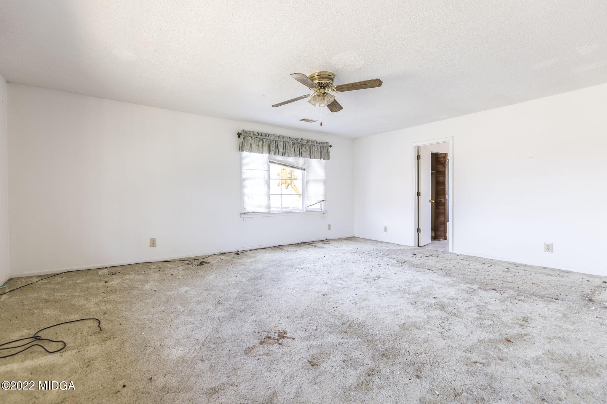 10 Mattie Road Fort Valley, GA 31030 - Photo 36 of 48 a view of an empty room with a window