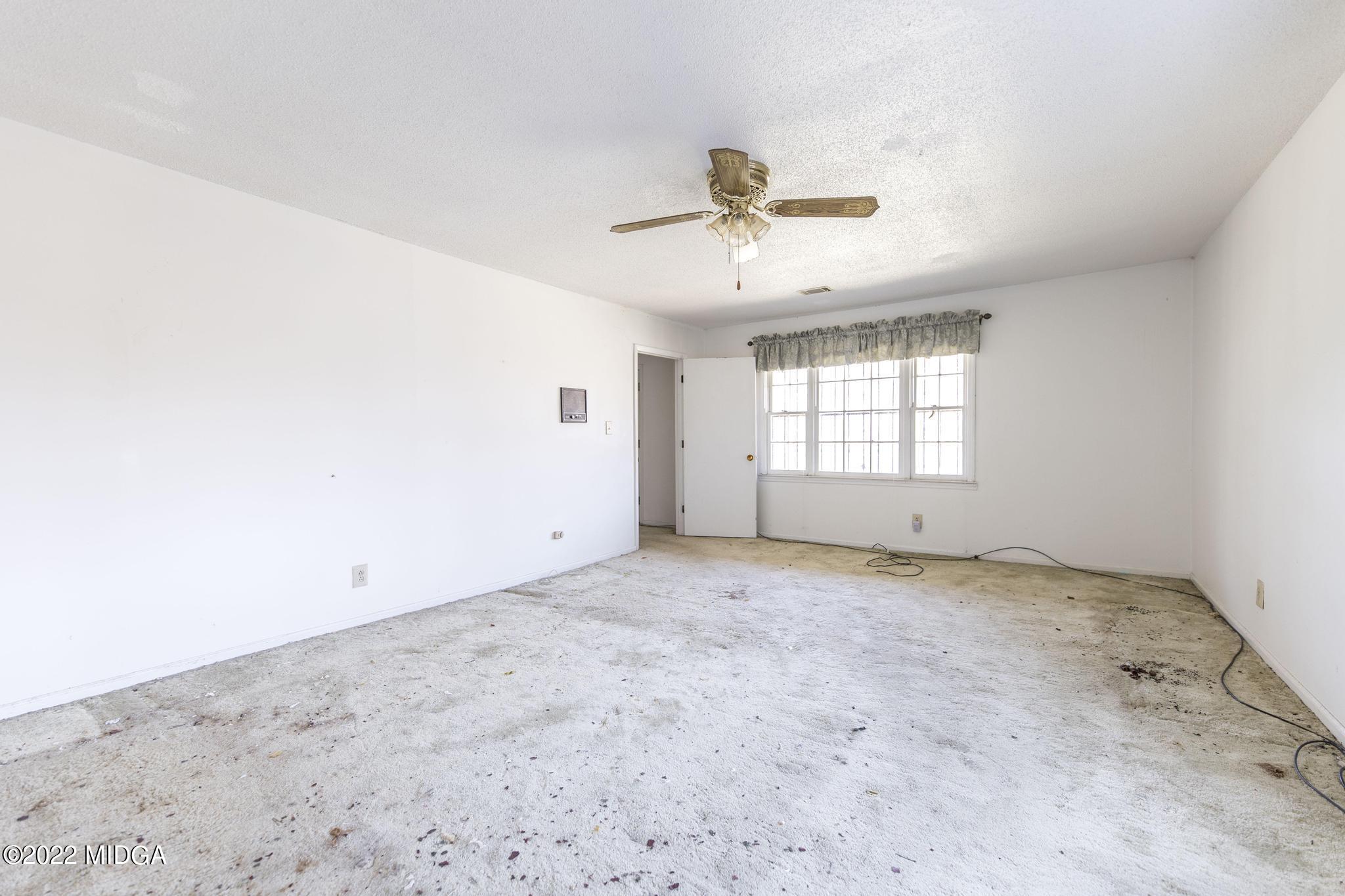 10 Mattie Road Fort Valley, GA 31030 - Photo 37 of 48 a view of an empty room with a window