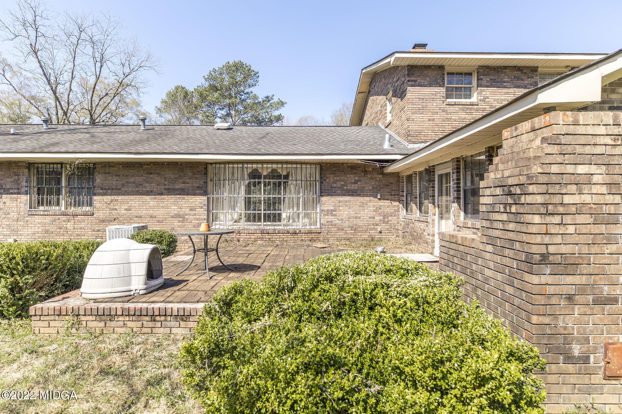 10 Mattie Road Fort Valley, GA 31030 - Photo 42 of 48 a front view of a house with garden