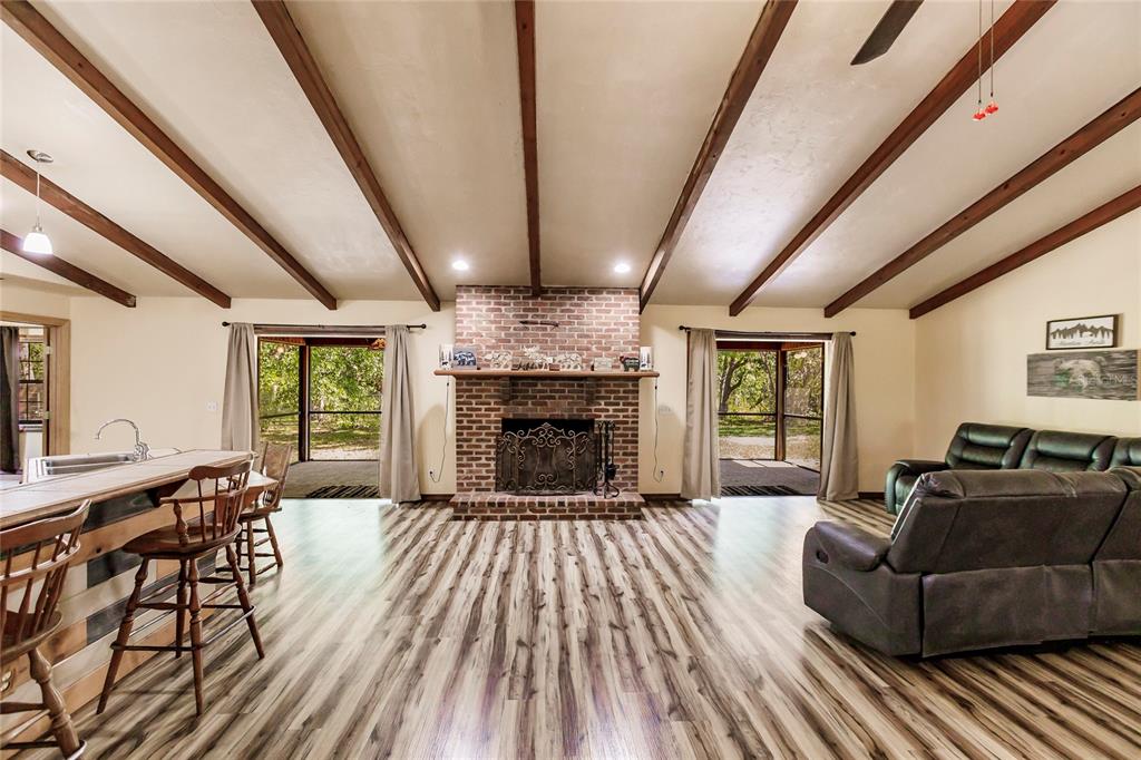 5826 Highway 72 Arcadia, FL 34266 - Photo 20 of 62 a living room with furniture and a fireplace