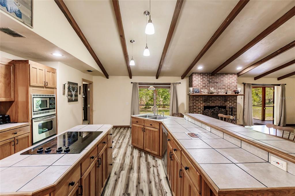 5826 Highway 72 Arcadia, FL 34266 - Photo 23 of 62 a kitchen with sink stove and refrigerator