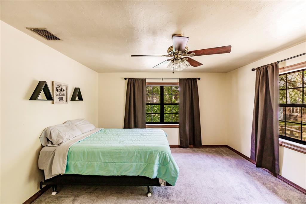 5826 Highway 72 Arcadia, FL 34266 - Photo 32 of 62 a bedroom with a bed and a window