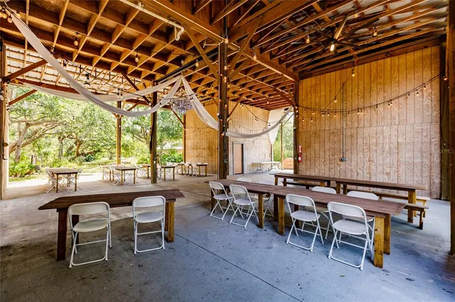 a view of a chairs and table in the patio