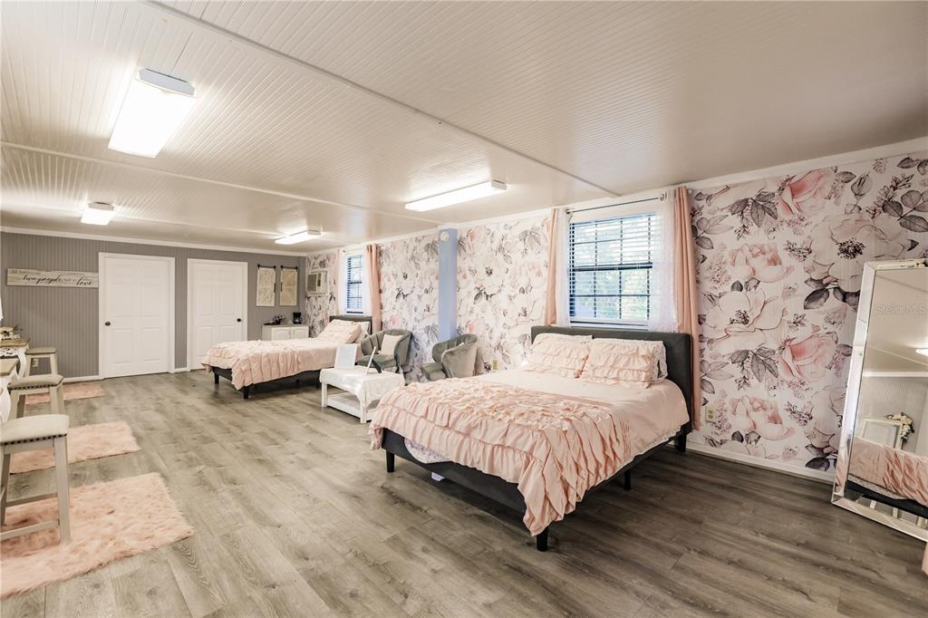 5826 Highway 72 Arcadia, FL 34266 - Photo 50 of 62 a spacious bedroom with a bed and a couch