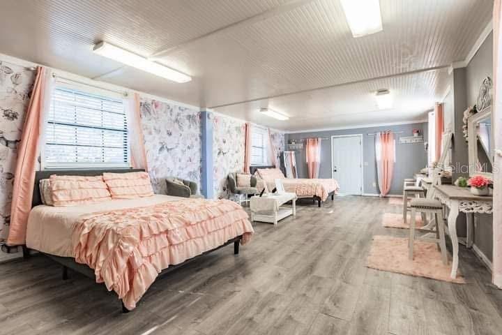 5826 Highway 72 Arcadia, FL 34266 - Photo 54 of 62 a bedroom with a bed and a large window