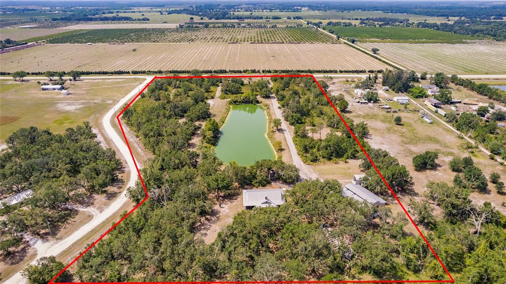 5826 Highway 72 Arcadia, FL 34266 - Photo 61 of 62 an aerial view of residential houses with outdoor space