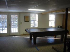 Undisclosed Address Marstons Mills, MA 02648 - Photo 2 of 6 a room with furniture pool table and windows