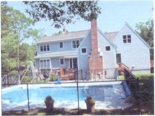 Undisclosed Address Marstons Mills, MA 02648 - Photo 6 of 6 a front view of a house with garden