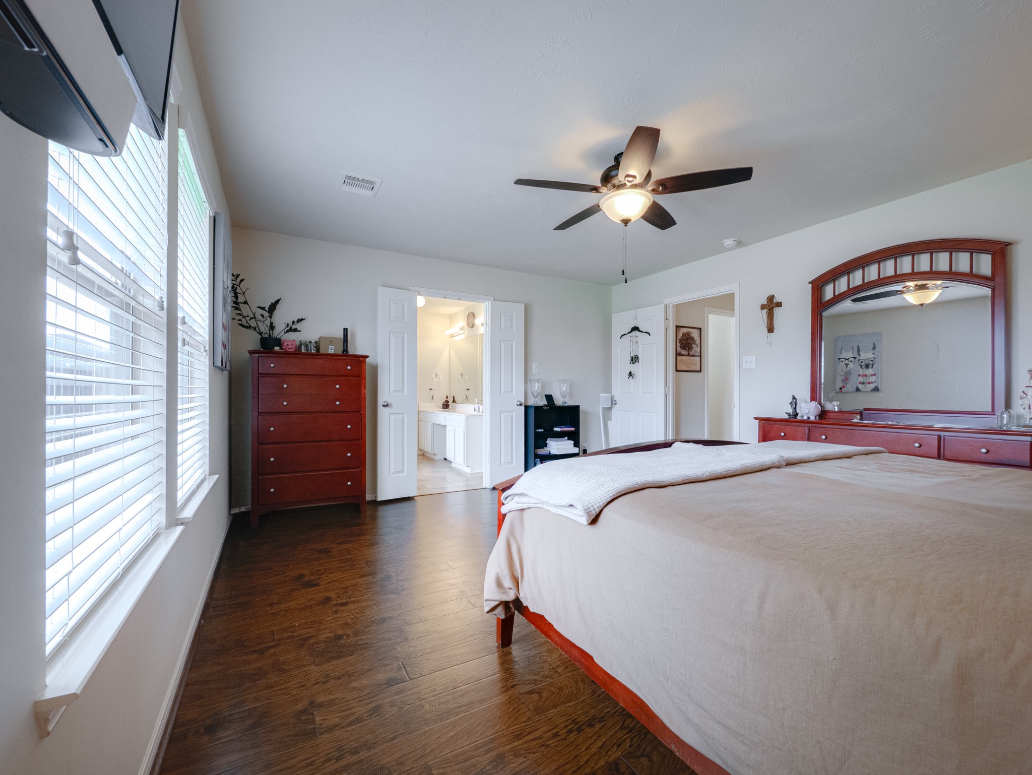 22106 Bridgestone Crossing Drive Spring, TX 77388 - Photo 16 of 26 Primary suite is downstairs and large enough for a king set.