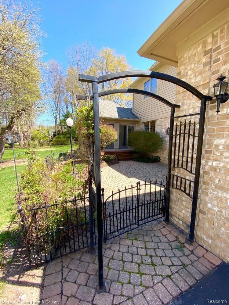 4233 Augusta Court Howell, MI 48843 - Photo 39 of 49 Gated Garden Area off Sunroom!