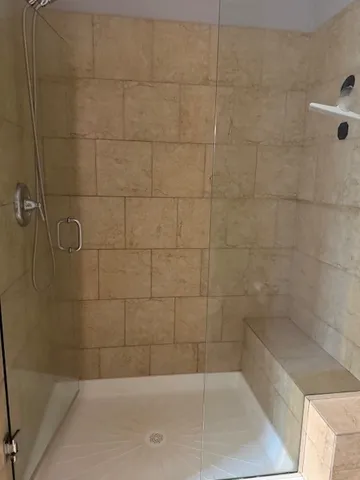 a bathroom with a bathtub and a sink