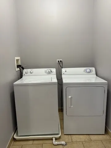 a kitchen with a sink and a mirror