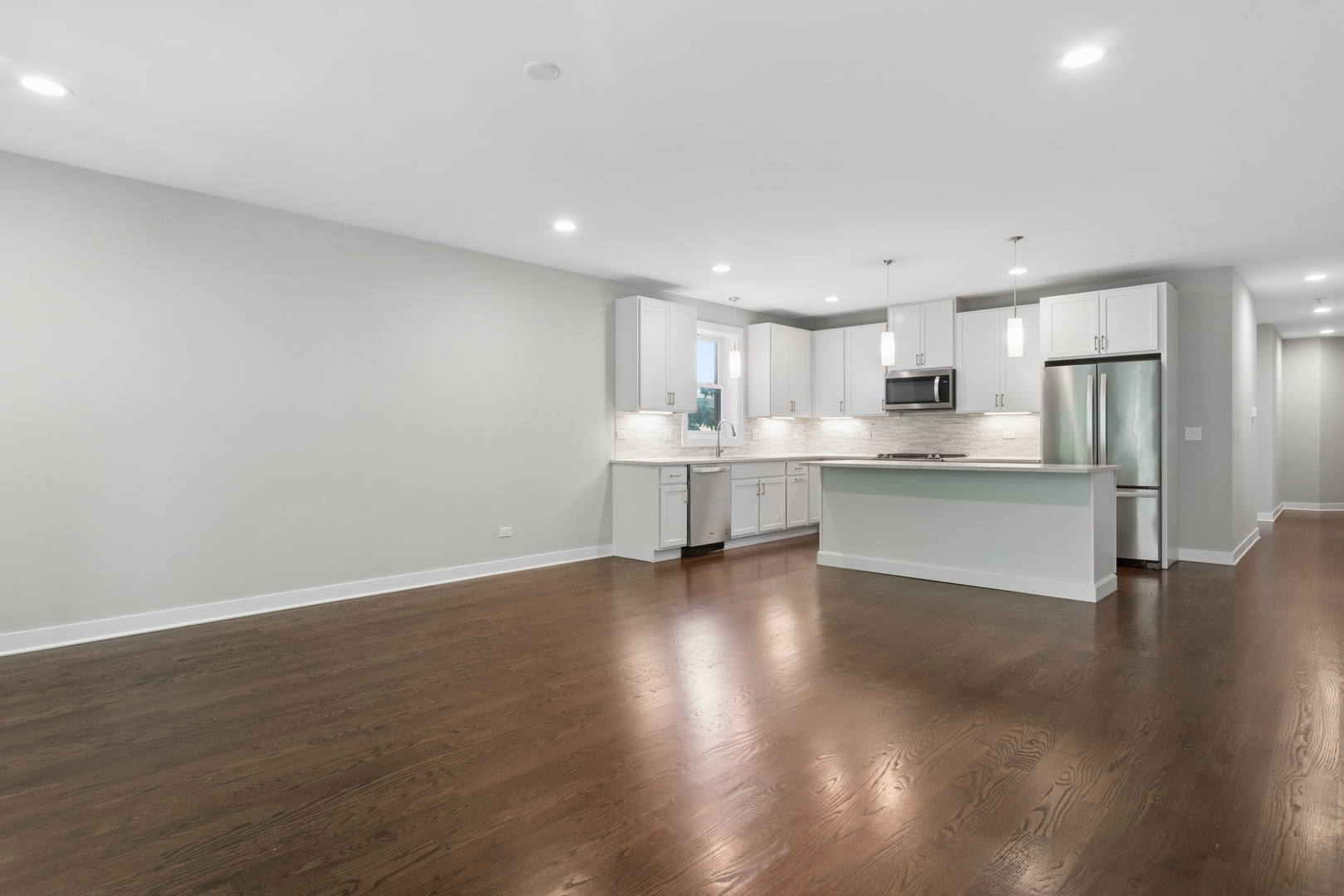 4845 North Keystone Avenue, Unit 2N Chicago, IL 60630 - Photo 6 of 21 a view of kitchen with wooden floor