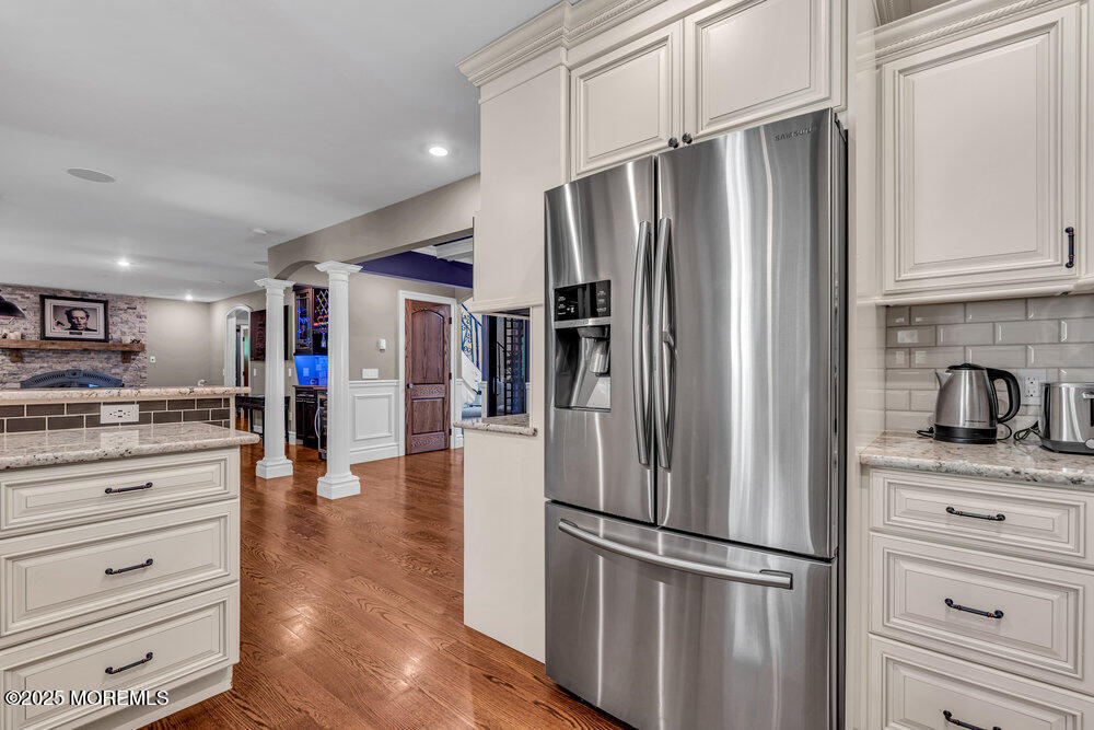 620 Brookside Drive Toms River, NJ 08753 - Photo 15 of 88 a kitchen with stainless steel appliances a refrigerator stove and cabinets
