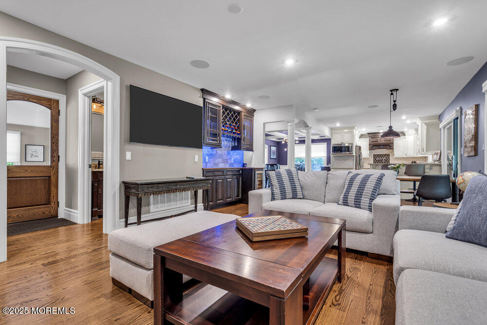 620 Brookside Drive Toms River, NJ 08753 - Photo 20 of 88 a living room with furniture kitchen view and a flat screen tv
