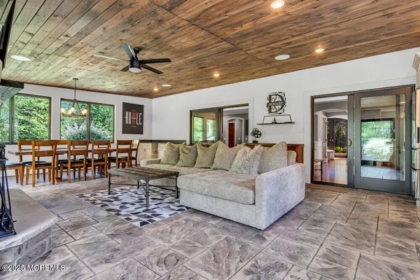 a view of a table and chairs in the garden