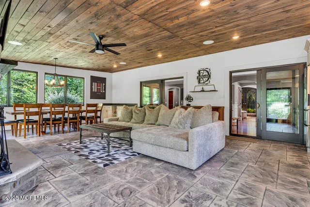 a view of a table and chairs in the garden