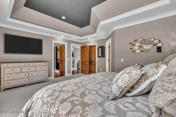 a bathroom with a sink a mirror and a bathtub