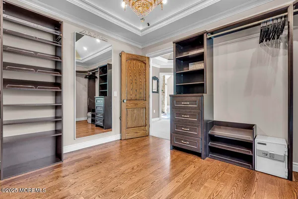 a view of a chairs and table in backyard