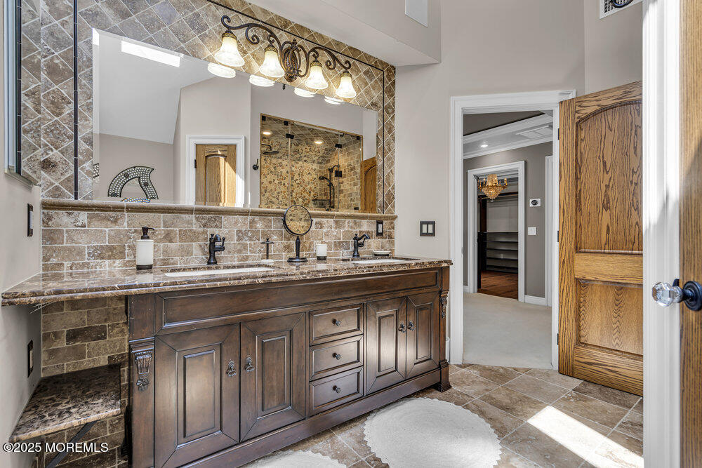 620 Brookside Drive Toms River, NJ 08753 - Photo 39 of 88 a bathroom with a granite countertop sink a mirror and a shower
